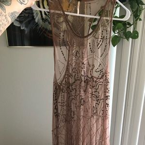 Sheer beaded and detailed dress